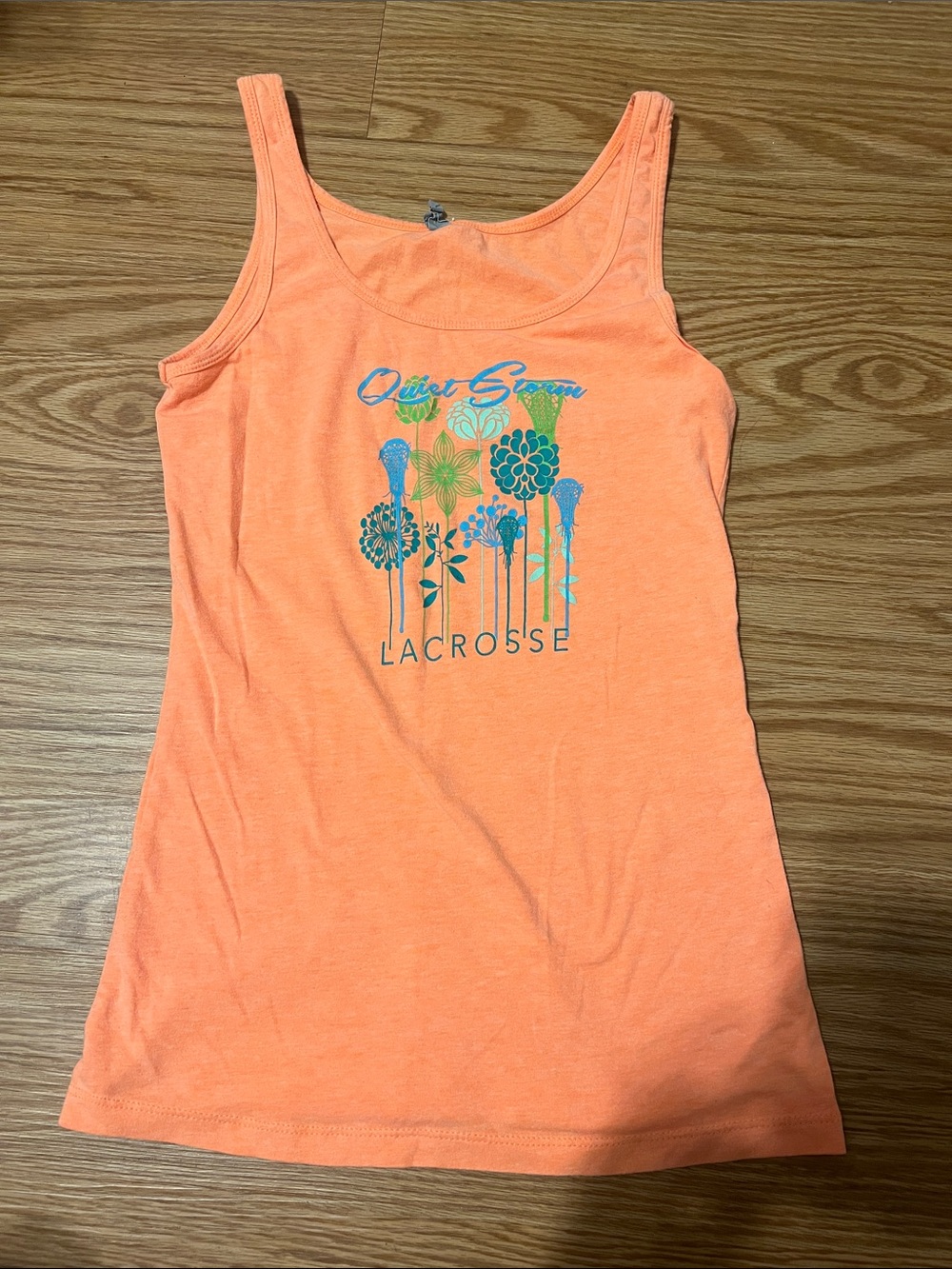 Next Level Apparel Orange Lacrosse Tank Top with Teal Floral Lacrosse Graphic